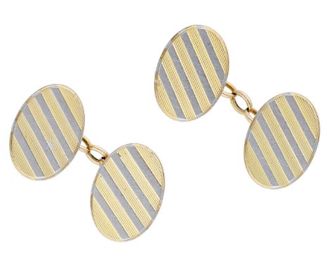 A pair of cufflinks, circa 1950, the bicolour cufflinks with diagonal reeded decoration, with chain connectors, maker’s mark 