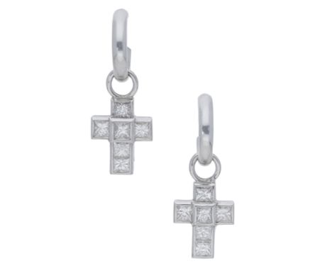 A pair of diamond earrings by Theo Fennell, the polished hoops each suspending a detachable cross, set throughout with prince