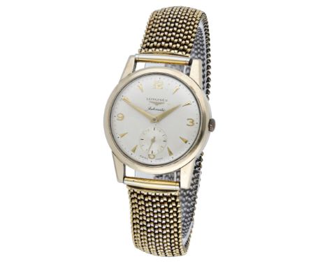 Longines. A gold automatic wristwatch, 1958. Movement: cal. 22A, automatic, 18 jewels, no. 9916553. Dial: silvered, applied A
