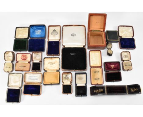 A collection of jewellery boxes dating from the late 19th Century and later. Most being tooled leather with gilt detailing. J