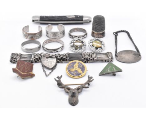 A selection of silver jewellery to include an Edwardian silver gate link bracelet with hallmarked silver heart padlock, marke