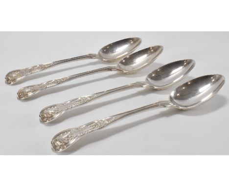 A set of four hallmarked silver Victorian dessert spoons. The spoons with palmette motifs to the terminals&nbsp;and an engrav