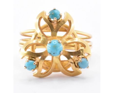 An 18ct gold and gemstone cluster harem ring. The ring set with turquoise cabochons having an openwork mount and wirework sha