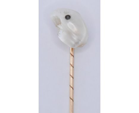 A 19th Century Victorian gold, pearl and diamond stick pin. The finial being set with a baroque pearl set with a round cut di