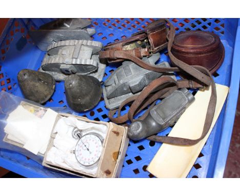 Two vintage Ayres and Smith helmets, three spelter desk top models of WW1 tanks, a leather case military issued Watts and son
