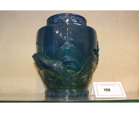 A Royal Worcester Sabrina Ware vase, with leaping fish amidst waves, blue and turquoise glazed overall, printed mark, date co