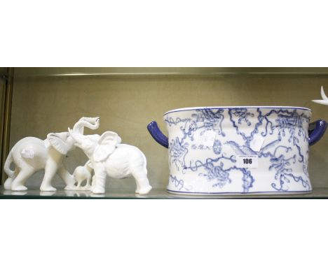 A quantity of Oriental items to include a blue and white dish, Imari pattern dishes, a ginger jar with cover, elephant jardin