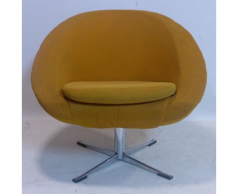 A vintage swivel tub chair on chrome base 