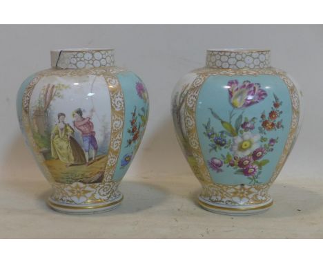 A pair of 19th century Dresden porcelain vases, hand painted with romantic scenes and floral panels, both drilled from previo