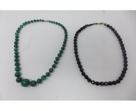 A vintage beaded jet necklace together with a beaded malachite necklace 
