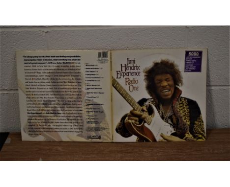 A Jimi Hendrix BBC sessions album on purple vinyl with poster
