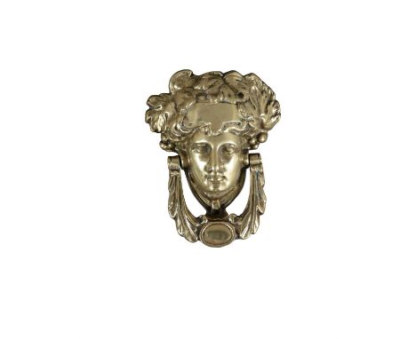 A GEORGIAN STYLE BRASS DOOR KNOCKER,   in the form of a Classical female head with swag knocker. 18 x 13cm