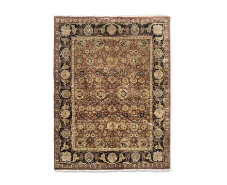 AN AFGHAN ZEIGLER PATTERN WOOL RUG, 370 X 270CM,  the central reserve woven with flower heads and tendrils in golden yellow t