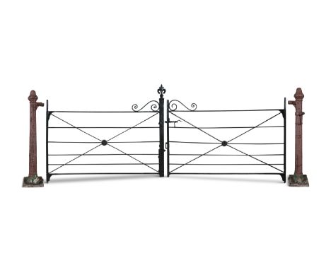 A SET OF CAST IRON DOUBLE AVENUE GATES, C.1860, STAMPED KEENAN &amp; SONS, FISHAMBLE STREET, DUBLIN.  painted black, with app