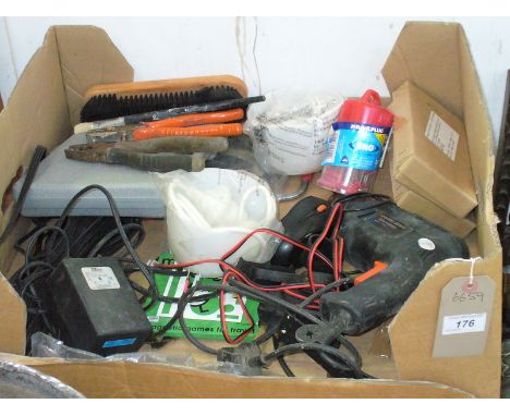 Assorted tools and fittings to a box.