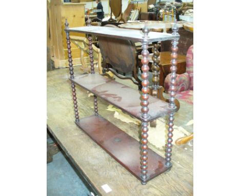A Mahogany 2 tier hanging wall shelf.