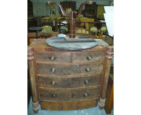 A 19th century mahogany bowfront chest of drawers and an antique mahogany tripod table. ( require restoration )