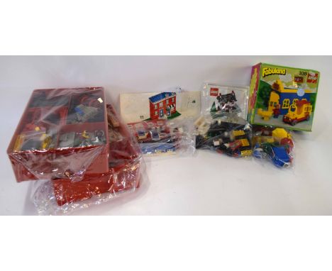 Quantity of vintage Lego to include two trays of assorted bricks and pieces, Lego Weetabix house set and others