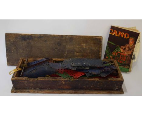 Vintage wooden case containing Meccano crane, together with instruction manual