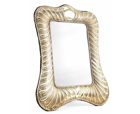 A hallmarked silver picture photo frame. The frame with easel back. Hallmarked year 1988 London. Sponsors mark for W W. Gross