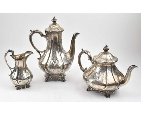 A hallmarked three piece silver tea &amp; coffee service. The lot to include a hallmarked silver coffee pot. Hallmarked 1849,