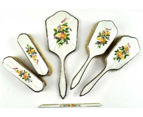 A George VI and Elizabeth II hallmarked silver and guilloche enamel dressing table set to include a mirror, two hair brushes,