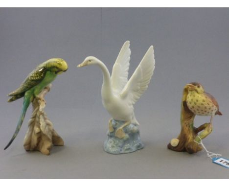 Crown Staffordshire Song Thrush, no. 278 by E J Bromley together with a Nao Swan and a Budgerigar