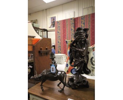Cast Metal Table Lamp in the form of a Chinese Man riding an Ox together with Japanese Hardwood Carved Figure of a Traveller 