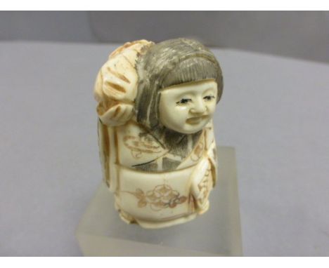Signed Oxbone Netsuke of a Lady carrying Fish