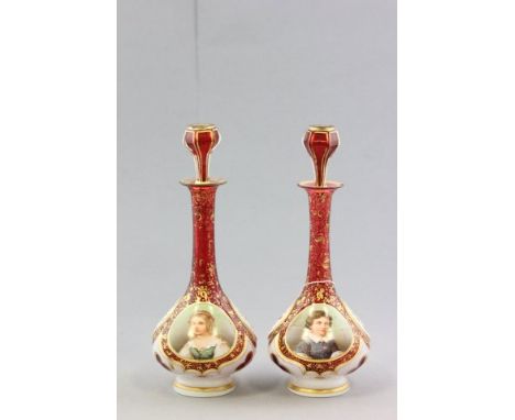 Pair of 19th century Red Bohemian Glass Decanters with Stoppers and gilt decoration, each with two handpainted panels on flow