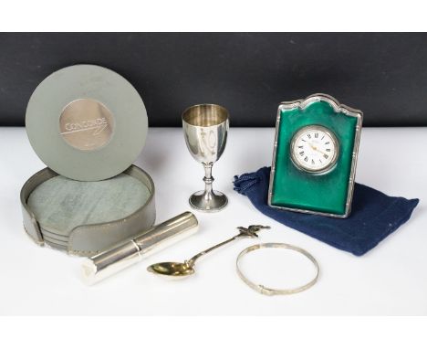 A small group of mixed collectables to include a hallmarked sterling silver and enamel desk clock, a hallmarked sterling silv