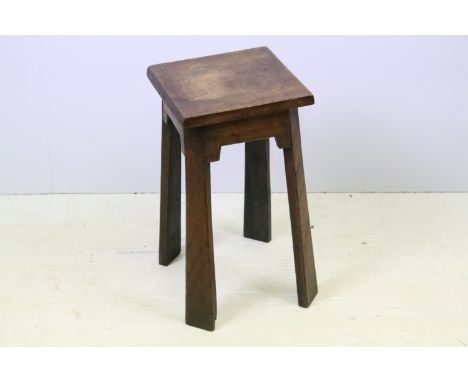 Arts and Crafts oak square stool in the Liberty manner, 44cm high x 28cm wide 