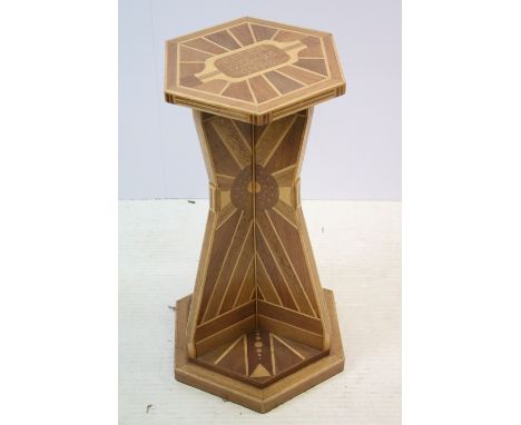 Art Deco marquetry lamp side table of hexagonal form with angular support with sunburst marquetry detailing. Measures 65cm ta