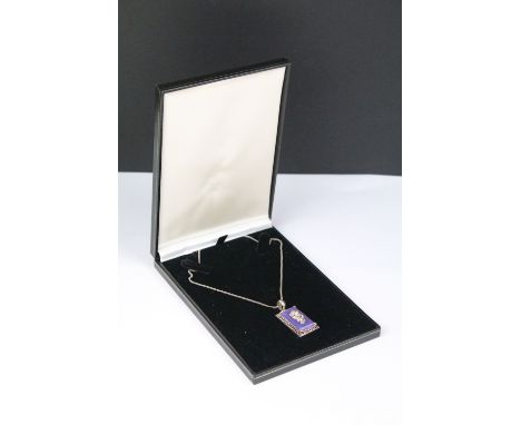 Chinese Silver and Lavender Jade Pendant on Chain with a dragon design, cased 