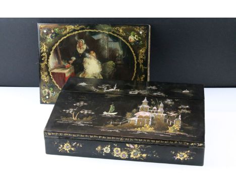 19th Century papier-maché blotter with an interior scene of two ladies at a dressing table, 30 x 23cm, together with a Japane