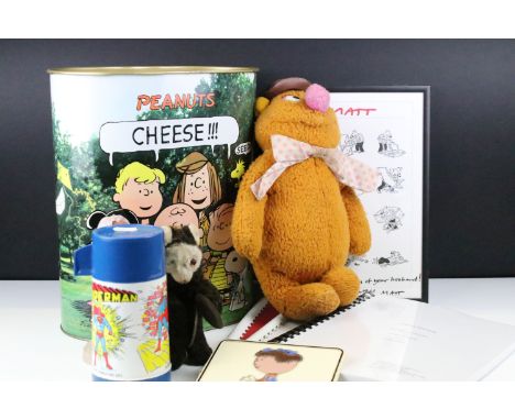 Mixed collectables to include an early-to-mid 20th century clockwork toy with key, Peanuts bin, Superman flask, 'Matt' cartoo