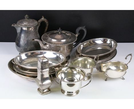 Silver plated ware including an oversized 3 pcs tea service set, a pair of oval twin handled serving dishes, a gravy boat, su