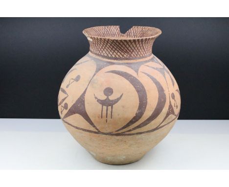 Chinese Neolithic painted terracotta vase having a tapering body with a flared rim and painted with hatching to rim and shape