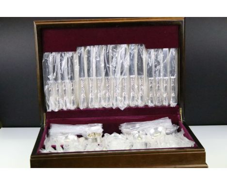 K. Bright of Sheffield - An eight setting canteen of silver plated cutlery, together with a silver hallmarked napkin ring 