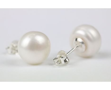Pair of large fresh water pearl stud earrings on silver posts 