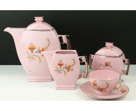 Cmielow Art Deco style pink part coffee service, with transfer printed decoration, comprising: coffee pot and cover, milk jug