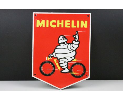 Michelin Man Enamel Sign featuring Mr Bidendum on a bicycle, on a red ground, 30cm x 23cm 
