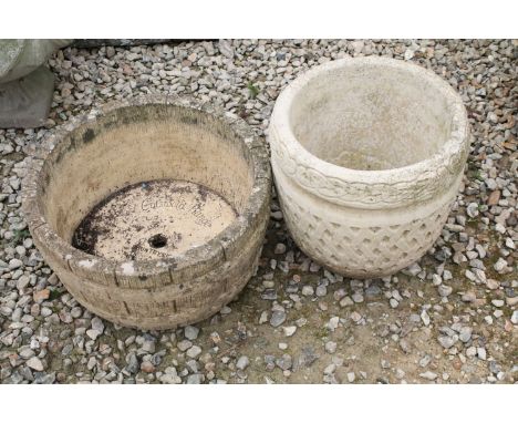 Cotswold Range circular stone garden planter, together with a Cotswold Studios Ltd example. Tallest approx 31cm 