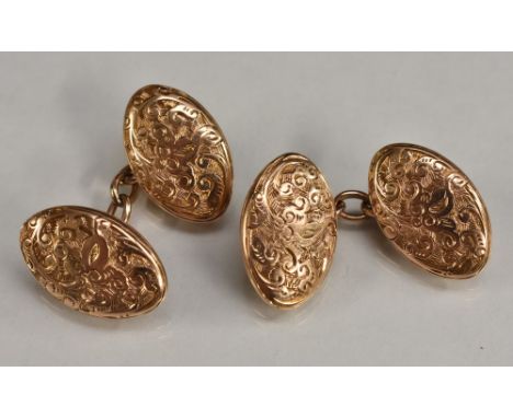 A pair of 9ct gold oval engraved and embossed oval panelled cufflinks, marked 10ct, W J H, 5.8g, fitted case, printed Lt Vinc