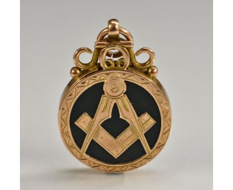 An early 20th century 9ct gold Masonic medal, open bloodstone body with compass square and rule front, floral reverse, initia