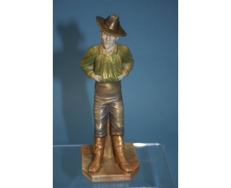A Royal Worcester figure of a man wearing a hat, with his hands in the tops of his trousers, puce mark, numbered 836, 18cm hi