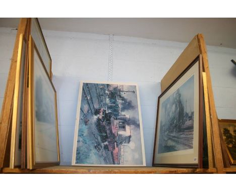 A shelf of framed prints, Terence Cuneo etc.