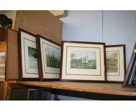 A shelf of prints, including 'Queen -Live Magic' gold record display