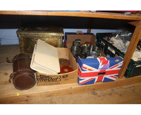 A shelf of miscellaneous, including pewter tankards