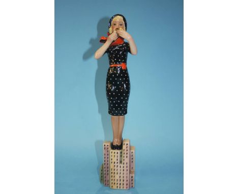 Il Grattacielo', A Lenci pottery figure by Abele Jacopi, circa 1930, modelled as a young lady with a compact and powder puff,